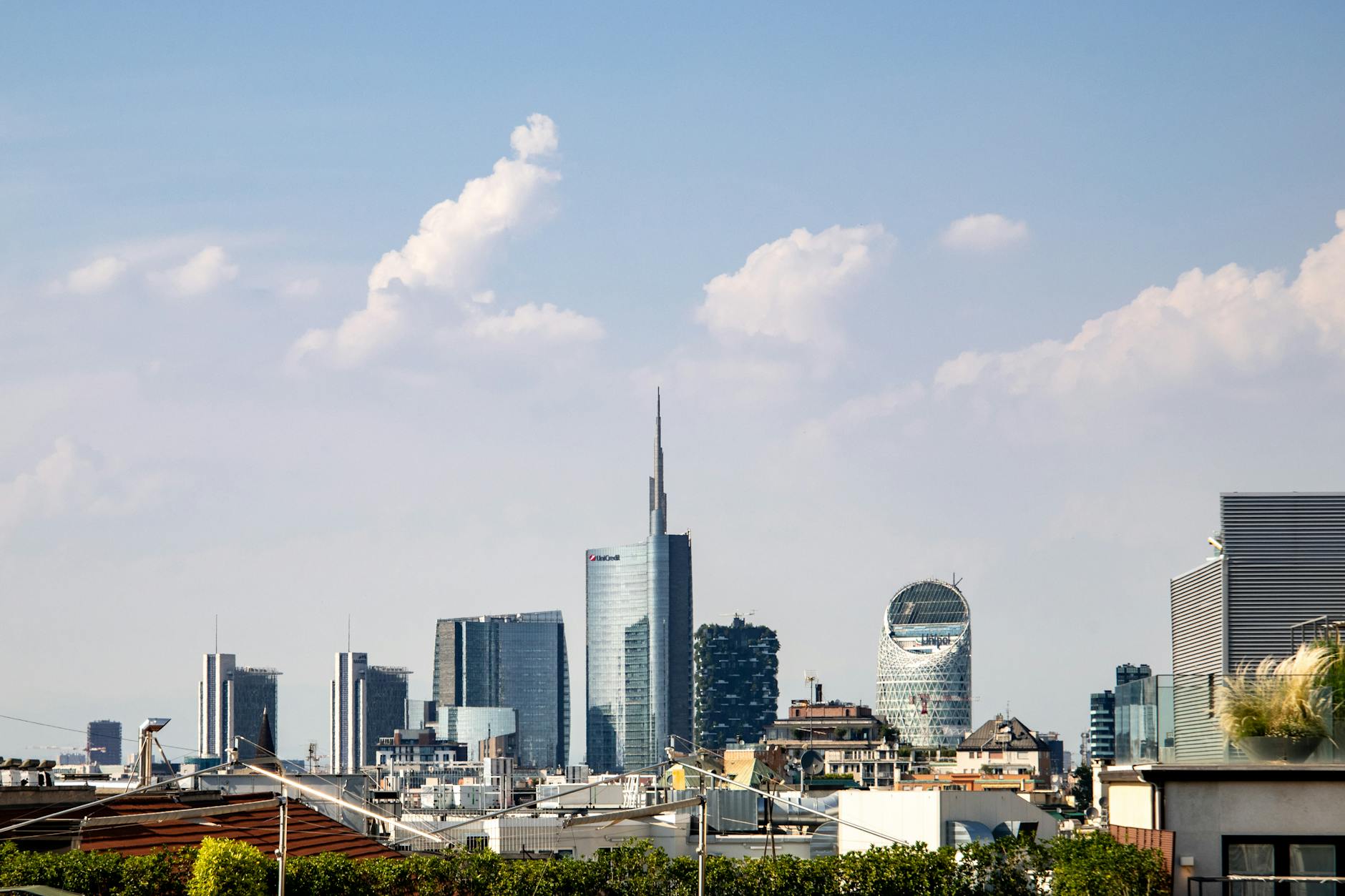 The free Biblioteca degli Alberi park beneath Porta Nuova skyscrapers